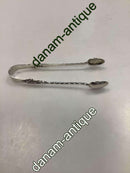 English Sugar Tongs in Sterling Silver with soldiers on the side