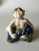 Royal Copenhagen Figur Faun med druer No 2361 - Danam Antik