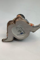 Royal Copenhagen overglasur egnsfigur af dreng med blomster Grønland No 12419 - Danam Antik