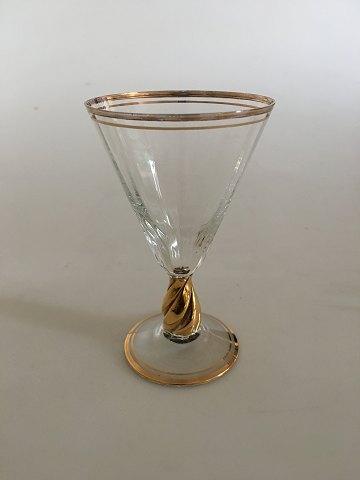 Holmegaard "Ida" hedvinsglas med guld på stilk, rand og fod. - Danam Antik