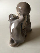 Royal Copenhagen Faun/Pan Figur med 2 aber No 2496 - Danam Antik