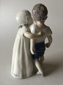 Royal Copenhagen Figurine No 406 af Pige der Krammer Dreng - Danam Antik