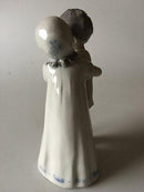 Royal Copenhagen Figurine No 406 af Pige der Krammer Dreng - Danam Antik