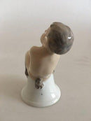 Royal Copenhagen Figurine af Faun på Klokke No 1208 - Danam Antik