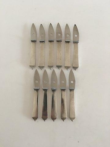 Georg Jensen Pyramide Sæt af 11 x Østersknive i Sterling Sølv og Rustfrit Stål. Med tidlige GJ Stempler - Danam Antik