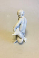 Bing & Grøndahl Blanc de Chine Figur af Dreng der holder på delfin No 4060 - Danam Antik
