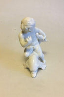 Bing & Grøndahl Blanc de Chine Figur af Dreng der holder på delfin No 4060 - Danam Antik