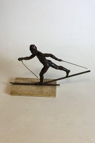 Royal Copenhagen Bronzestatuette af Langrendsløber. Designet af Sterett-Gittings Kelsey i 1976 - Danam Antik
