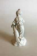 Royal Copenhagen Bisquitfigur af pige med neg og segl - Danam Antik