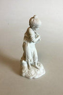 Royal Copenhagen Bisquitfigur af pige med neg og segl - Danam Antik