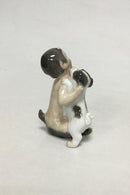 Royal Copenhagen Figur af Faun med hund No 2823 - Danam Antik