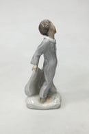 Royal Copenhagen Figur af Dreng med puder No 2604 - Danam Antik