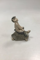 Royal Copenhagen Figur af Faun på Skildpadde No 858 - Danam Antik