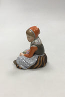 Royal Copenhagen overglasur egnsfigur af pige med blomster "Fyn" No 12420 - Danam Antik