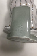 Royal Copenhagen Figur af kvinde med blomsterbuket - Danam Antik