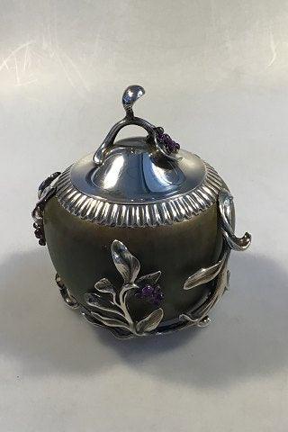 Royal Copenhagen(Patrick Nordstrøm)Stentøjskrukke med Anton Michelsen Sølvmontering og ametyster - Danam Antik